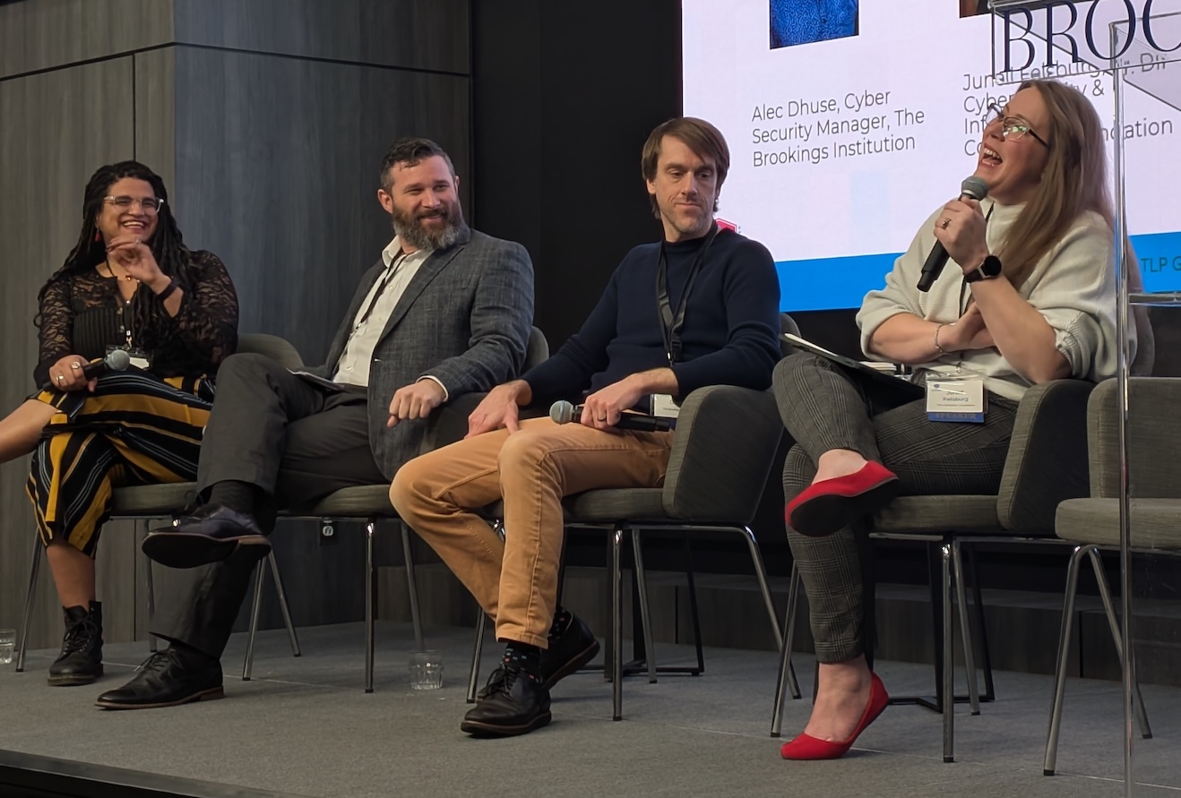 Conference participants on a panel