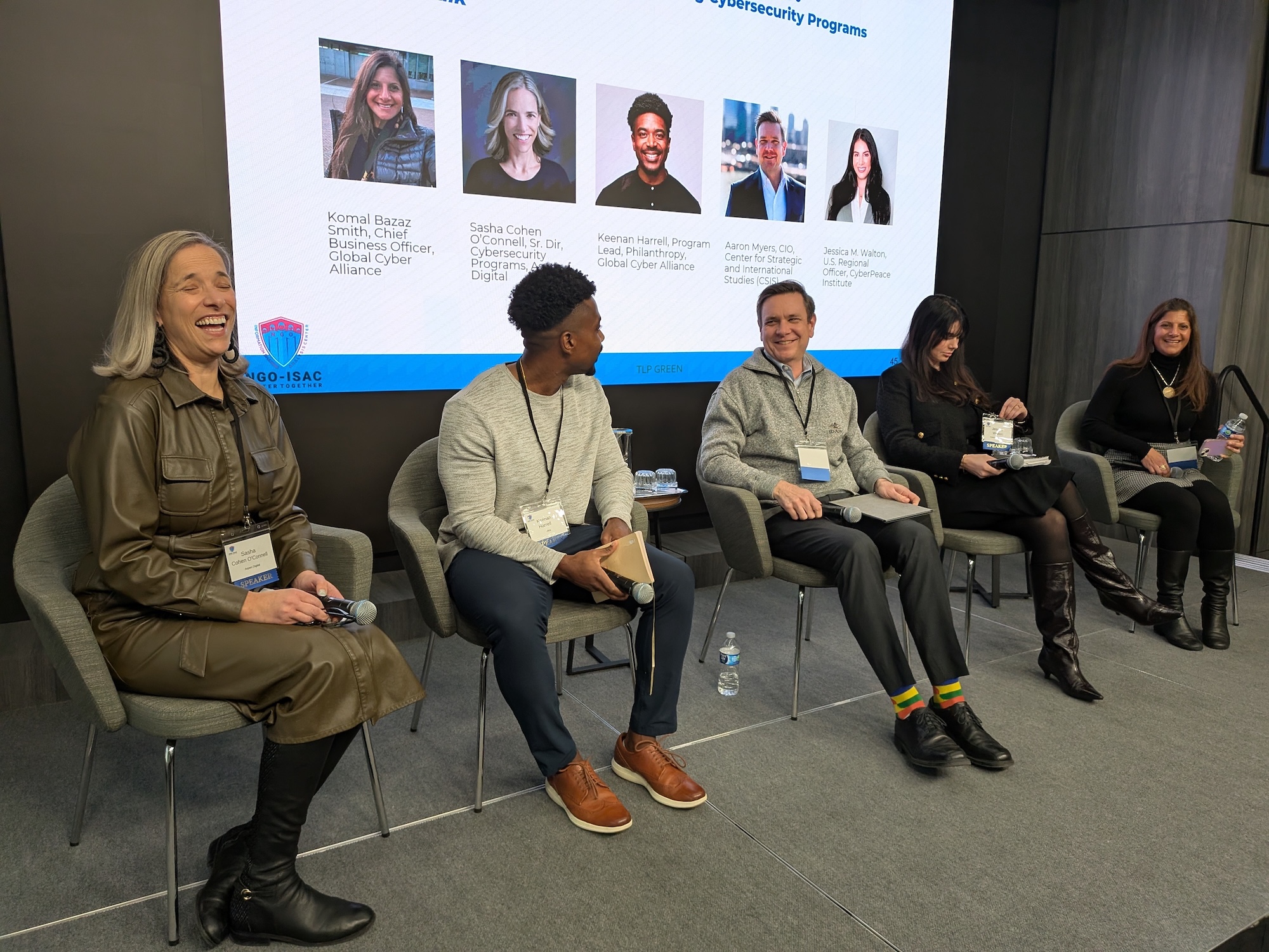 Conference participants on a panel