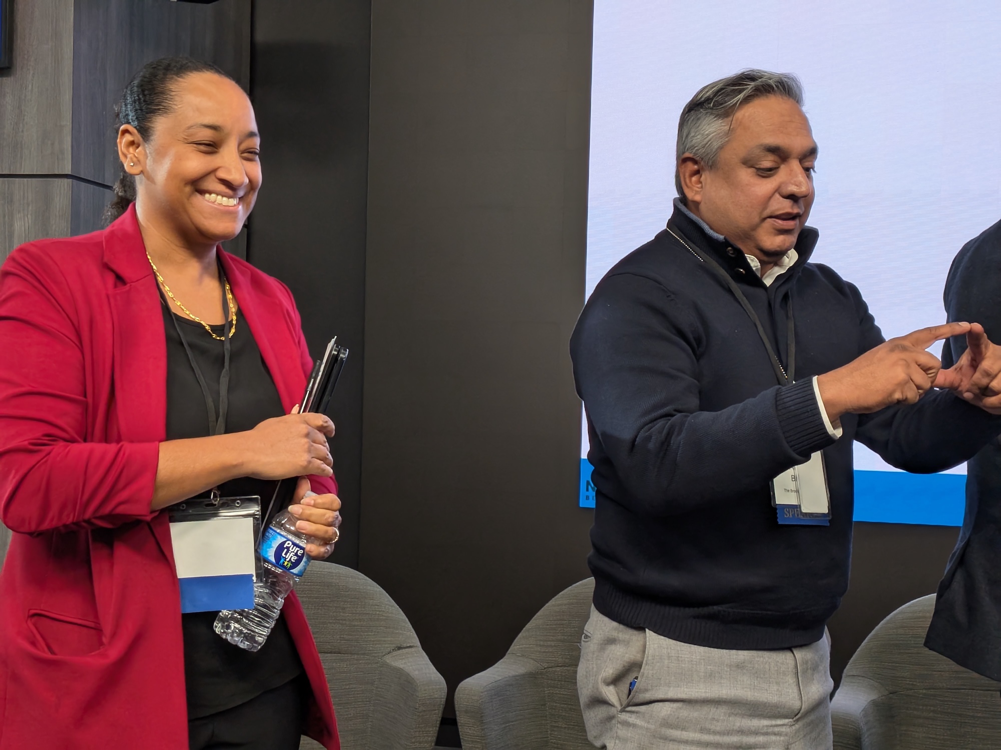 Conference participants on a panel